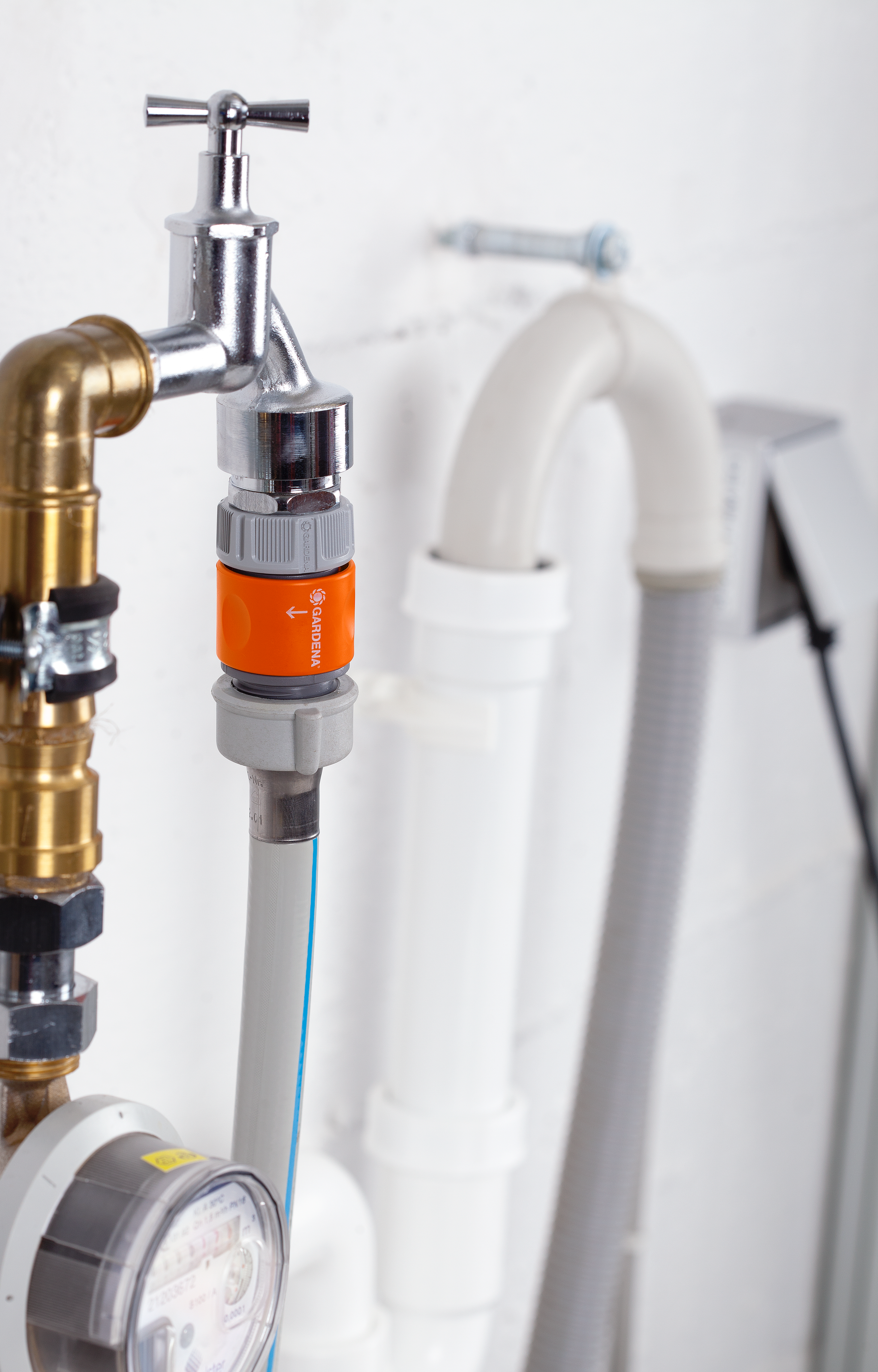 Close-up view of a plumbing setup with various pipes and connectors.