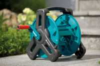 Gardena hose reel placed on a stone surface outdoors., miniatuur 5