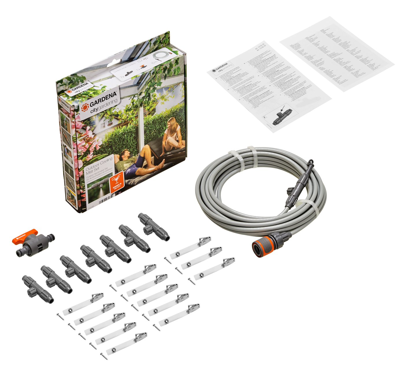Gardena garden irrigation kit including hose, connectors, and instruction manual.